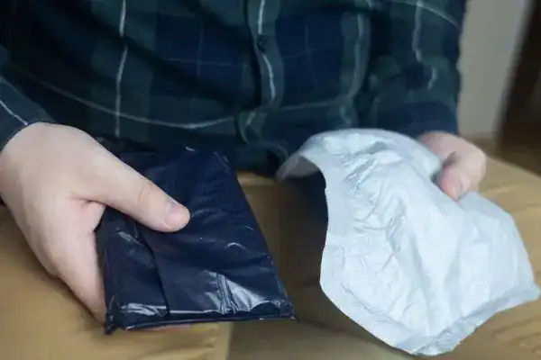 image of man holding stool incontinence Wolverhampton products